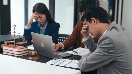 failure, lost case of asian lawyers team meeting post-contract, contract finalization, lawyers discussing agreements, contract review session, agreement assessment, legal experts in conversation