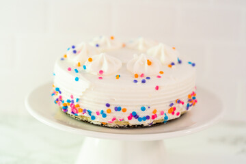 Fototapeta na wymiar Birthday cake with funfetti sprinkles