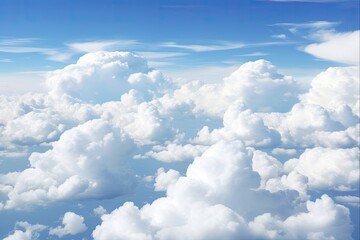 Naklejka na ściany i meble Sky View: Stunning Close Up of Fluffy Cumulus Clouds High in Blue Skies - Picturesque Aerial Cloudscape in White and Blue