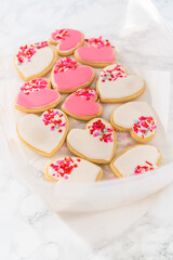 Heart-shaped sugar cookies with royal icing