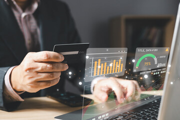 man use graphs and progress of business and analyze financial,and investment.Use technology to plan strategy to success goals and growth stock.online business,e-commerce,online marketing.