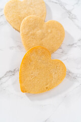 Heart-shaped sugar cookies with royal icing