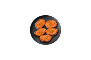 Delicious sandwich consisting of toast, red sauce with salt, spices and herbs