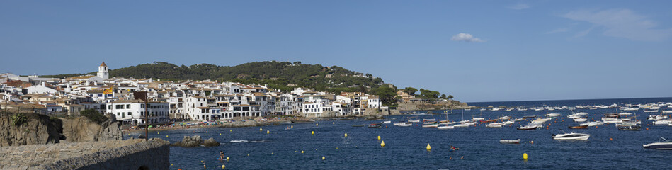 Fototapeta na wymiar Calella de Palafrugell, traditional whitewashed fisherman village and a popular travel and holiday destination.