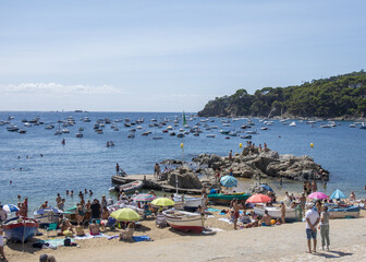 Fototapeta na wymiar Calella de Palafrugell, traditional whitewashed fisherman village and a popular travel and holiday destination.