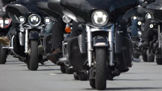 4K - Convoy of bikers on motorcycles. Close-up