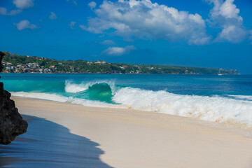 Tropical beach with ocean and waves in Bali