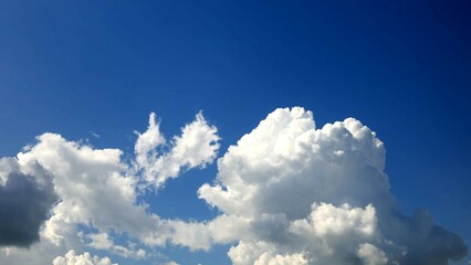 A serene and tranquil scene, with the sky mirroring a pristine lake, adorned with the gentle ripples of wispy clouds