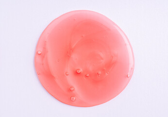 Transparent red cosmetic sample texture with bubbles. Cosmetic shower gel. Cosmetic red serum,...
