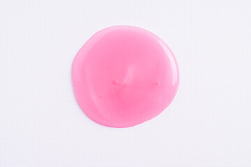 Transparent pink cosmetic sample texture with bubbles. Cosmetic shower gel. Cosmetic rose pink serum, beauty background.