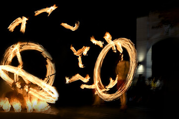 Motion Blur Long Exposure Photography Of Fire Ball Dancers At Kandy Esala Procession In Kandy, Sri Lanka. This Historical Parade Is Held Annually To Pay Homage To The Sacred Tooth Relic Of Lord Buddha - Powered by Adobe