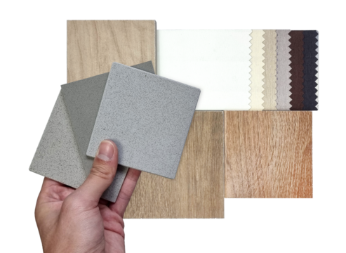 architect compares interior material samples between stone quartz, drapery fabric catalog, multi color and texture of wooden ceramic tiles isolated on background with clipping path. close up view.