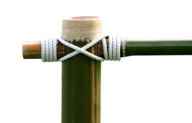 Bamboo frame tied with white rope on the corner isolated on white background 