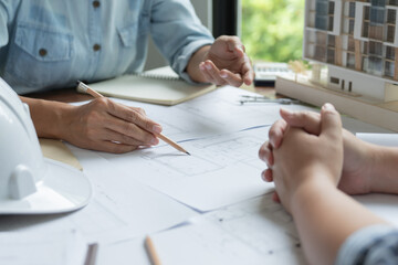 Architecture drawing on architectural Creative project business architecture building construction Industrial engineering Achievement Planning Design on blueprint Teamwork