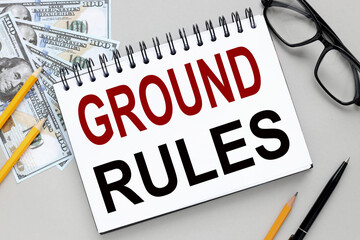 GROUND RULES banknote notepad. text on notebook