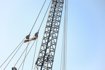 Construction machinery symbolizes progress and teamwork, shaping the future by building the...