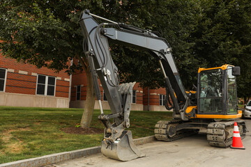 Construction machinery symbolizes progress and teamwork, shaping the future by building the...