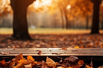 Obraz premium Beautiful autumn landscape with Colorful foliage in the park. Falling leaves on a wooden desk natural background. High quality photo