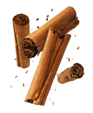 Fresh dried raw Cinnamon stick falling in the air