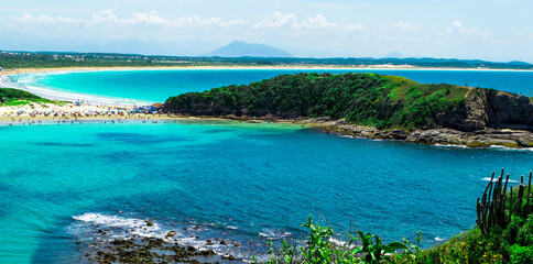 Top view of Praia das Conchas, close to the city of Cabo Frio, with white sand beaches, blue sky,...