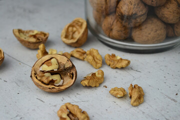 walnut on a light table and in a jar