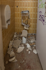 view of a completely broken ceramic toilet