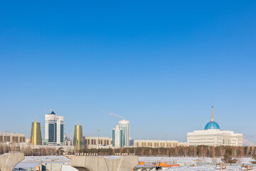 Modern residential buildings on sunny winter day, Nur-Sultan, Astana, Kazakhstan. High quality photo