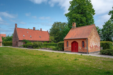 Fototapeta na wymiar Small house at St. Mary Church grounds former Carmelite Priory - Helsingor, Denmark