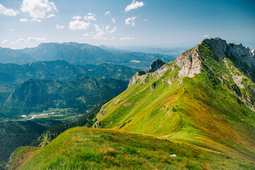 Belianske Tatras, where Slovakia and Poland share a picturesque border amidst a serene mountain landscape - obrazy, fototapety, plakaty