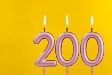 Candle 200 with flame - Birthday card on yellow luxury background