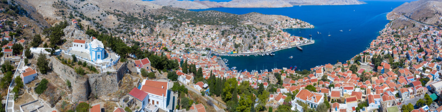 Colorful houses village in Symi island, Dodecanese islands, Greece.