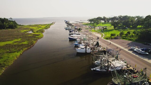 aerial of boats in ocean springs harbor overlooking gulf of Mexico
