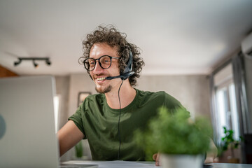 One man caucasian male freelancer work from home on laptop computer