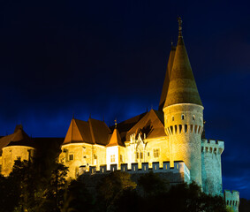 Photo of Corvin Castle which is histirical landmark on sunset of Romania.
