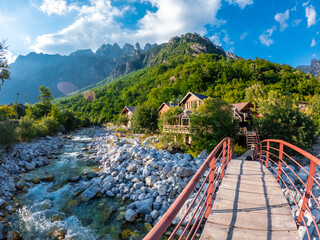 Red bridge along the river of Valbona Valley, Theth National Park, Albanian Alps, Albania