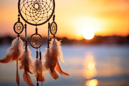 Dream catcher with feathers threads and beads rope hanging. Dreamcatcher handmade. background with copy space.