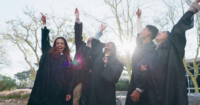 Happy students, graduation and hats in celebration, achievement or accomplishment together at campus. People, friends or graduate in milestone, degree or diploma in happiness for education or goals