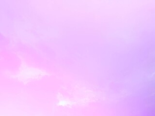 The background of the sky with natural clouds on the gentle twilight atmosphere with pastel rainbow gradations blends pink, purple and blue like subtle, and the faded white mist blur adds soft.
