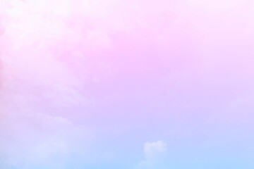 The background of the sky with natural clouds on the gentle twilight atmosphere with pastel rainbow gradations blends pink, purple and blue like subtle, and the faded white mist blur adds soft.