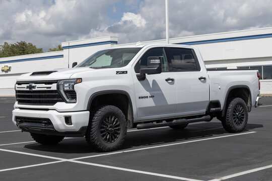 Chevrolet Silverado 2500 display at a dealership. The Chevy Silverado 2500 is available with gas or diesel engines.