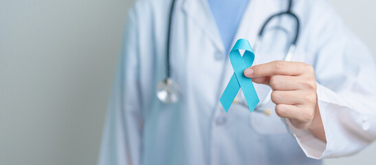 Blue November Prostate Cancer Awareness month, Doctor with Blue Ribbon in hospital for support...