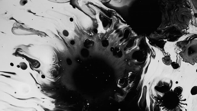 Ink surface. Oil splash. Black fluid stains spreading on white dark mud patterns abstract dynamic background.