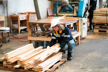 Industrial factory employee working in wooden manufacturing industry