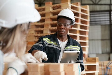 Industrial factory employee working in wooden manufacturing industry