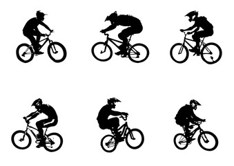 Obraz premium Silhouette of boys riding a bmx bicycle