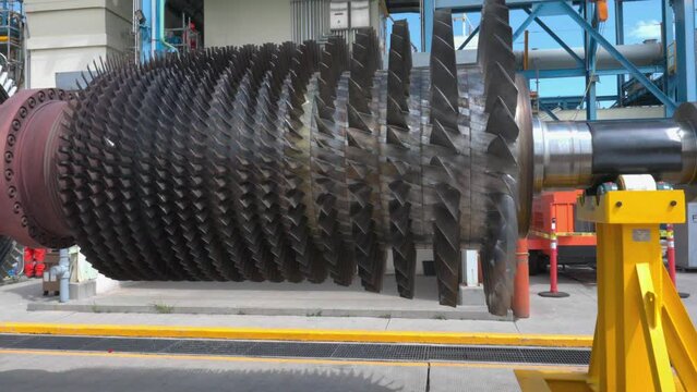 a disassembled turbine rotor and compressor