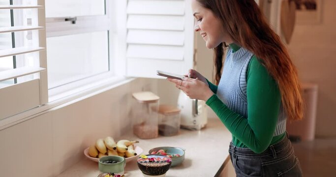 Woman, phone photography and food in kitchen, table and happy with results for post on web blog in home. Influencer girl, smartphone or chef with memory, nutrition and diet with social media update