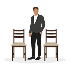 Business man stands near the chairs on a white background
