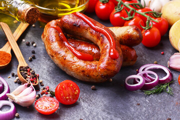 Pork sausages with spices and vegetables