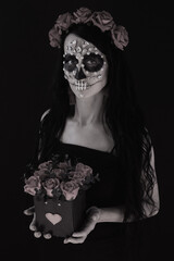 woman look as Death with red  roses wreath hold  bouquet roses